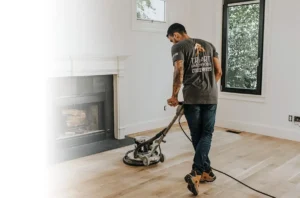 image of a man buffing hardwood floors