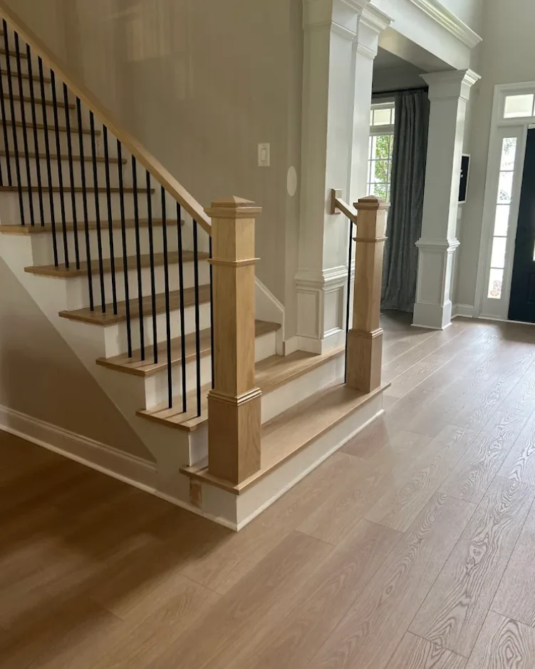 White oak hardwood stair installation with square newel posts in Dunwoody, GA