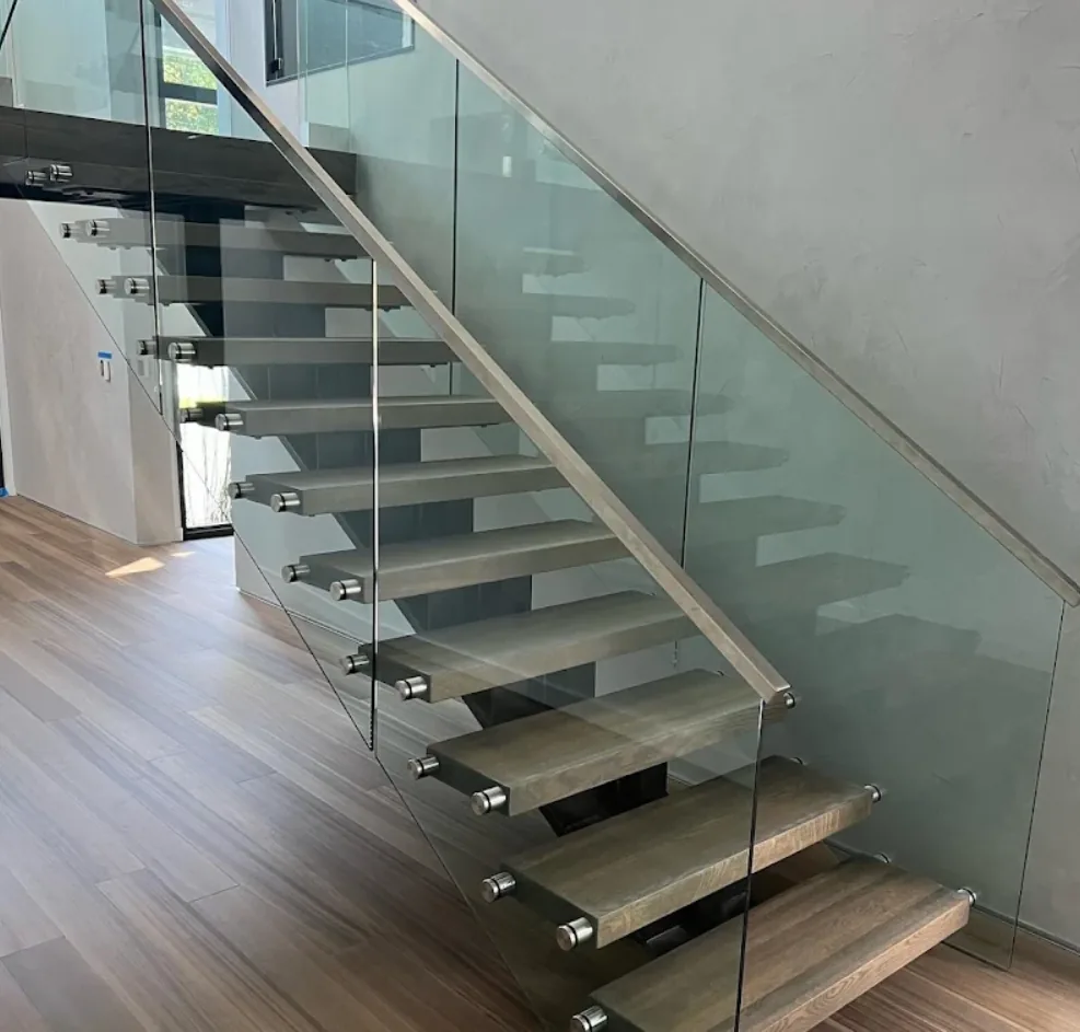 Floating hardwood staircase with glass railing installed in Milton, GA
